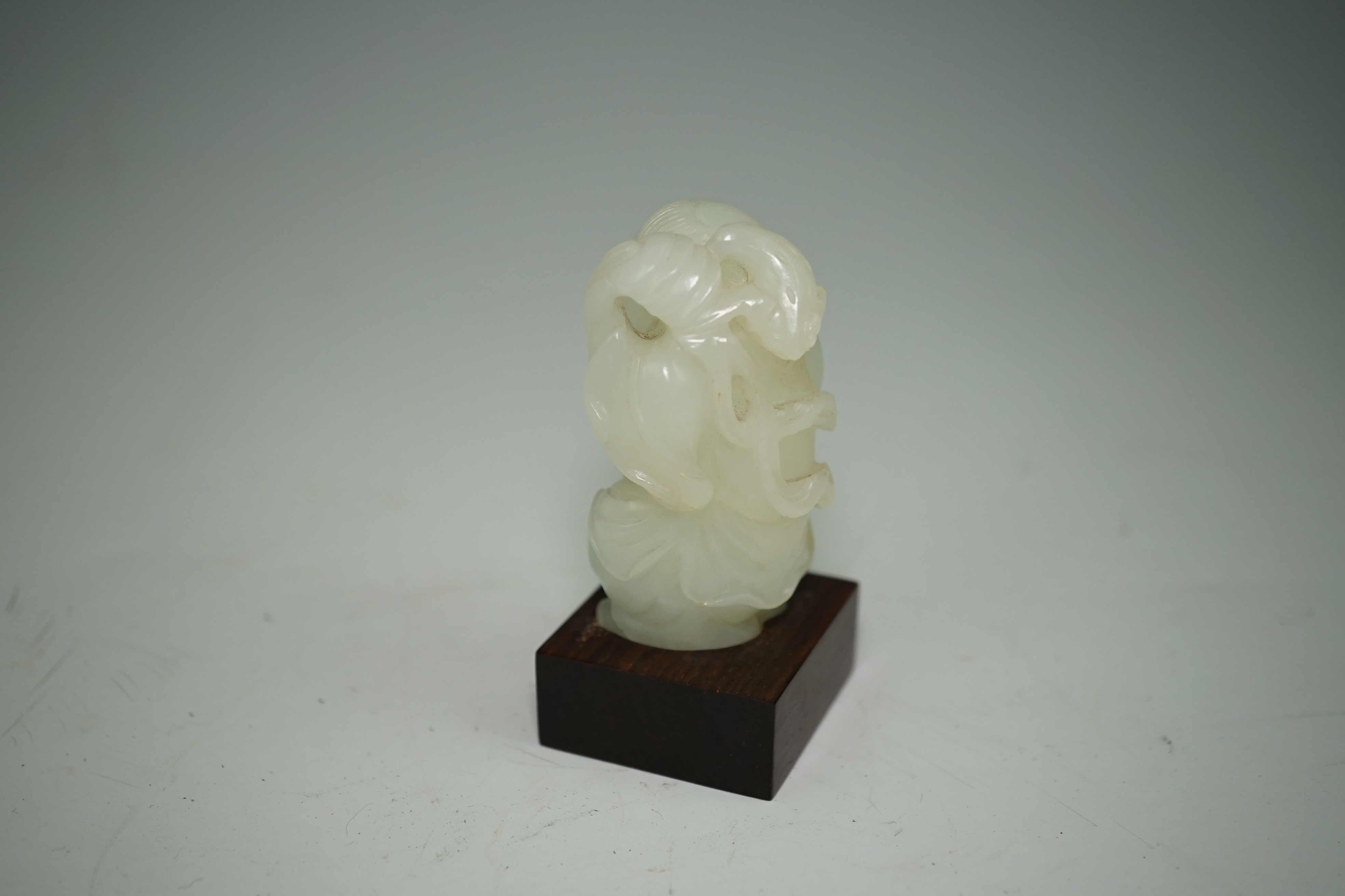 A Chinese white jade figure of Liu Hai, 18th-19th century